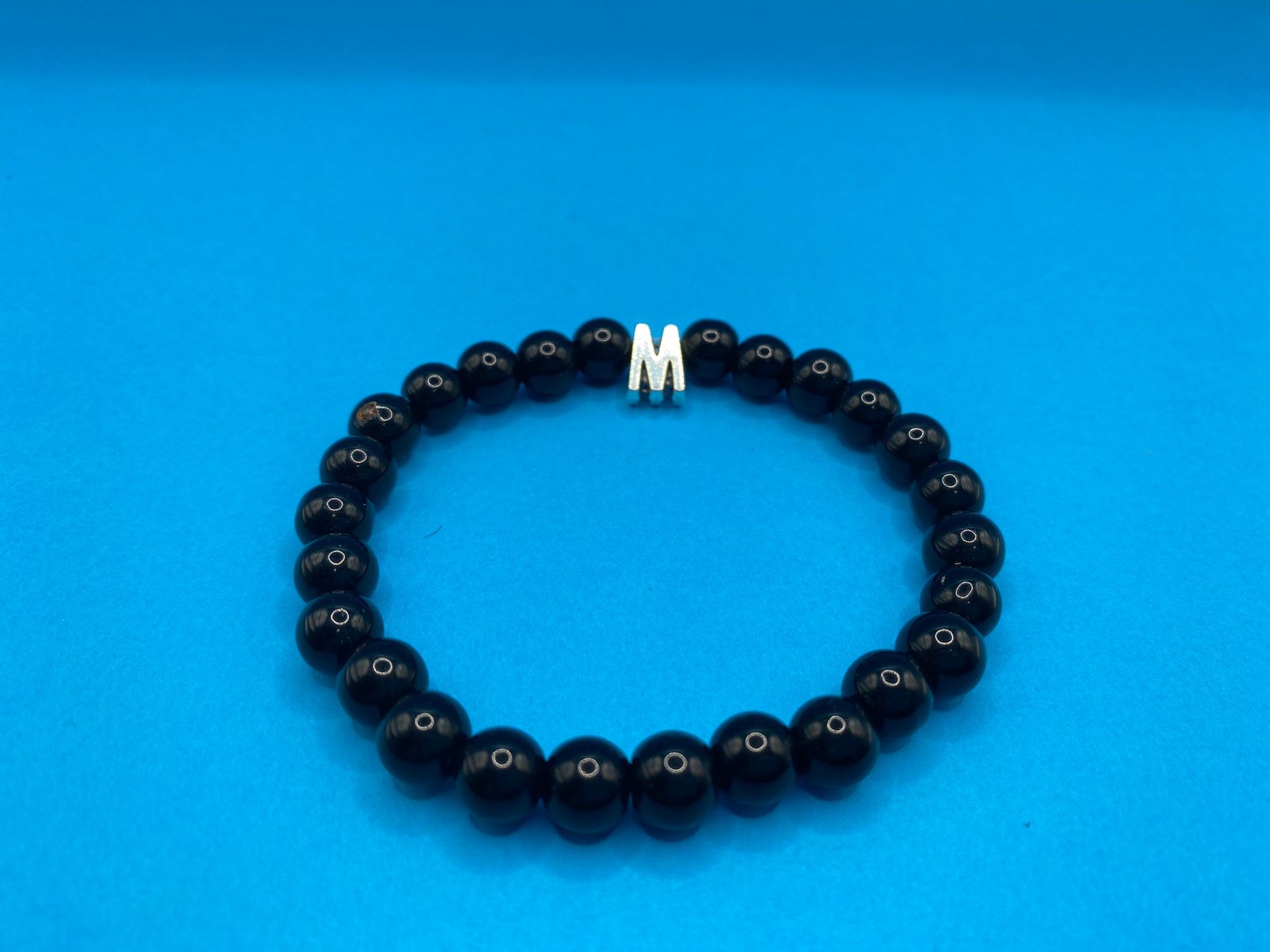 Pulsera de cuencas negras